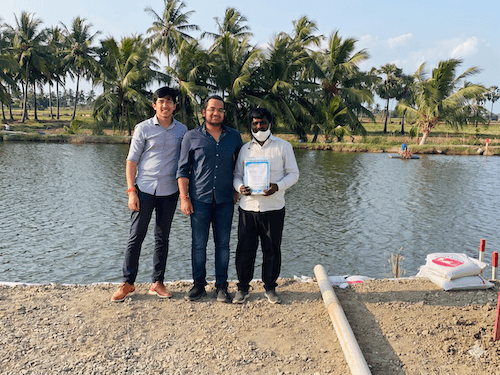 Wyldox team with shrimp farmer in Nellore